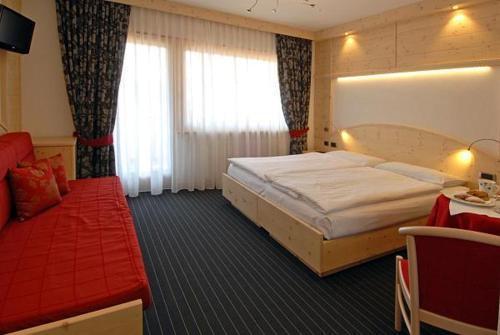 Hotel Flora Alpina Кампітелло-ді-Фасса Екстер'єр фото